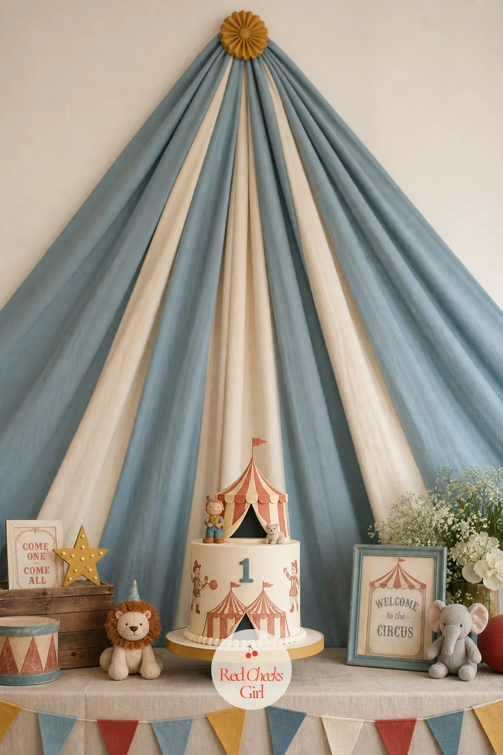 Dusty Blue and Cream Canopy Backdrop — A plain wall behind the cake table photographs flat, and flat is not the mood here. Vintage circus first birthday