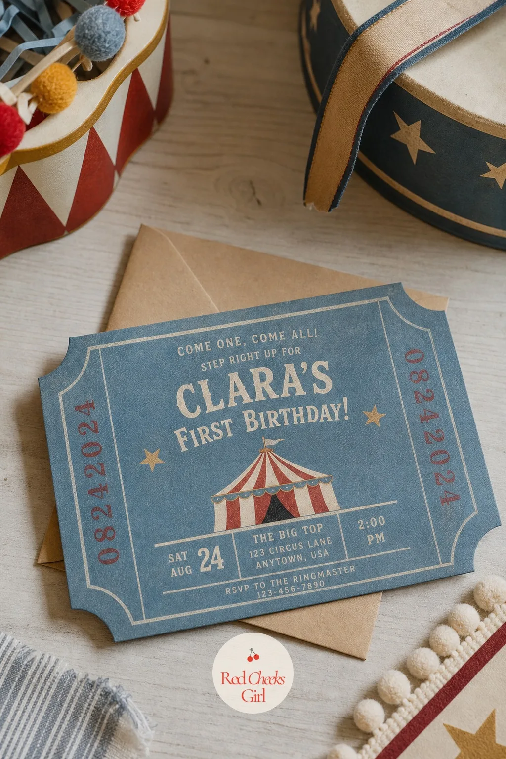 Dusty Blue Ticket-Style Invitation — A ticket shape stands out in a stack of mail far more than a standard rectangle does. Vintage circus first birthday
