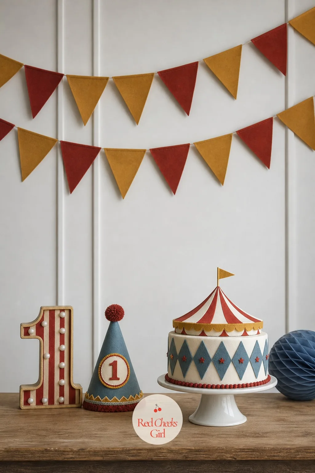 Mustard and Muted Red Pennant Backdrop — Not every wall is worth hanging a full canopy on, and that is fine: a pennant line does almost the same job with far