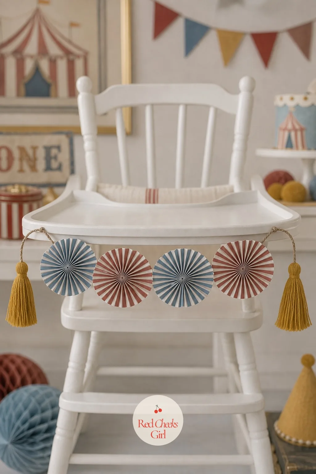 Striped Paper Fan High Chair Garland — If felt feels like one more thing to buy, paper does the same job for less. Vintage circus first birthday
