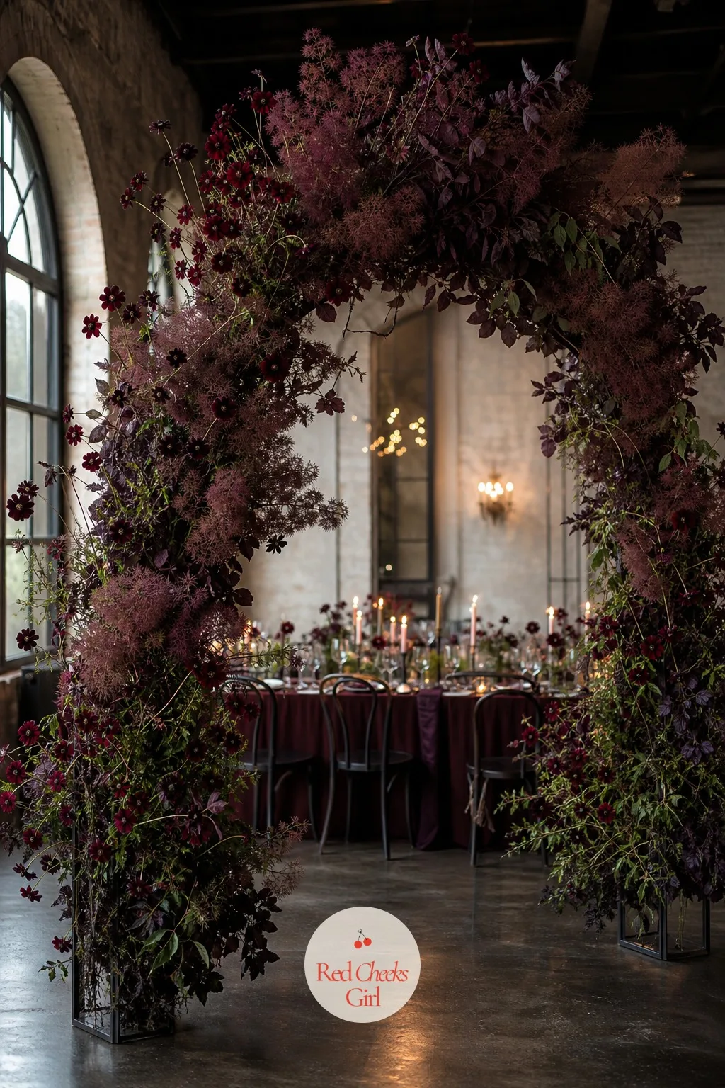 Chocolate Cosmos and Smoke Bush Arch — Not every bride wants white and green, and a moody, almost burgundy-brown palette reads like nothing else on a board of