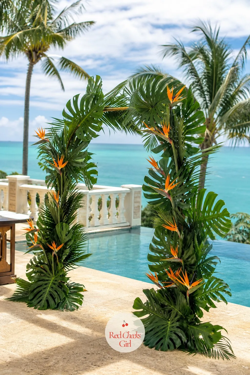 Tropical Monstera and Bird of Paradise Arch — A beach or destination ceremony deserves a palette the florist down the road from a city venue can't give her