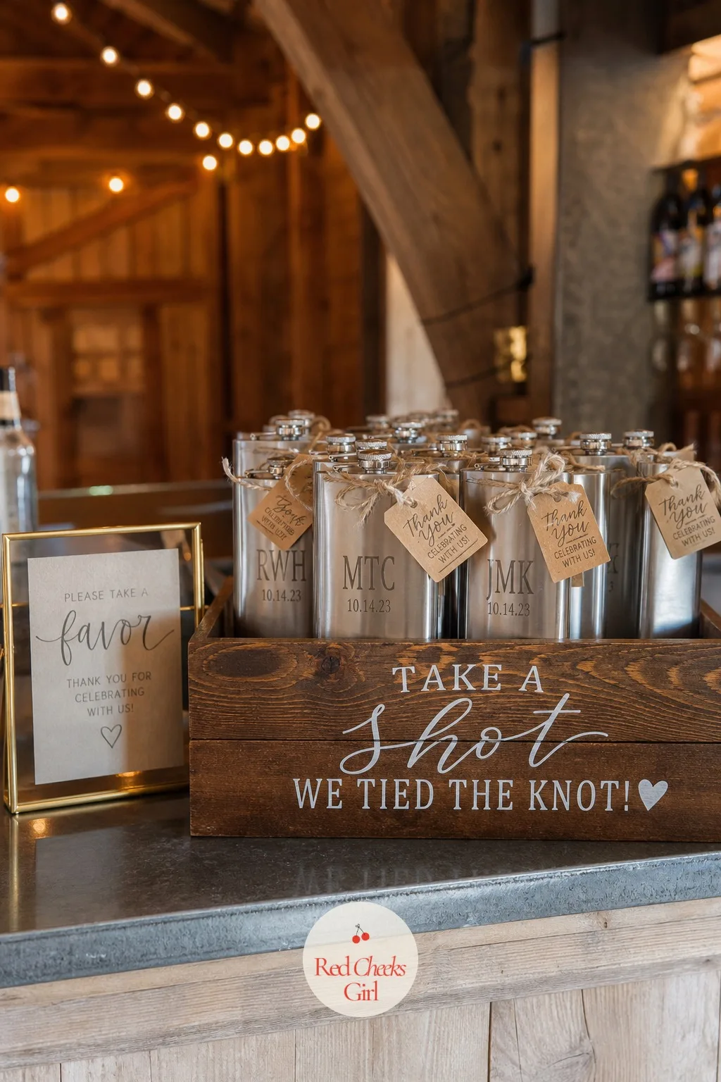 Engraved Flask Favor Display — A favor table across the room often gets ignored until the very end of the night, but a favor sitting right at the bar gets
