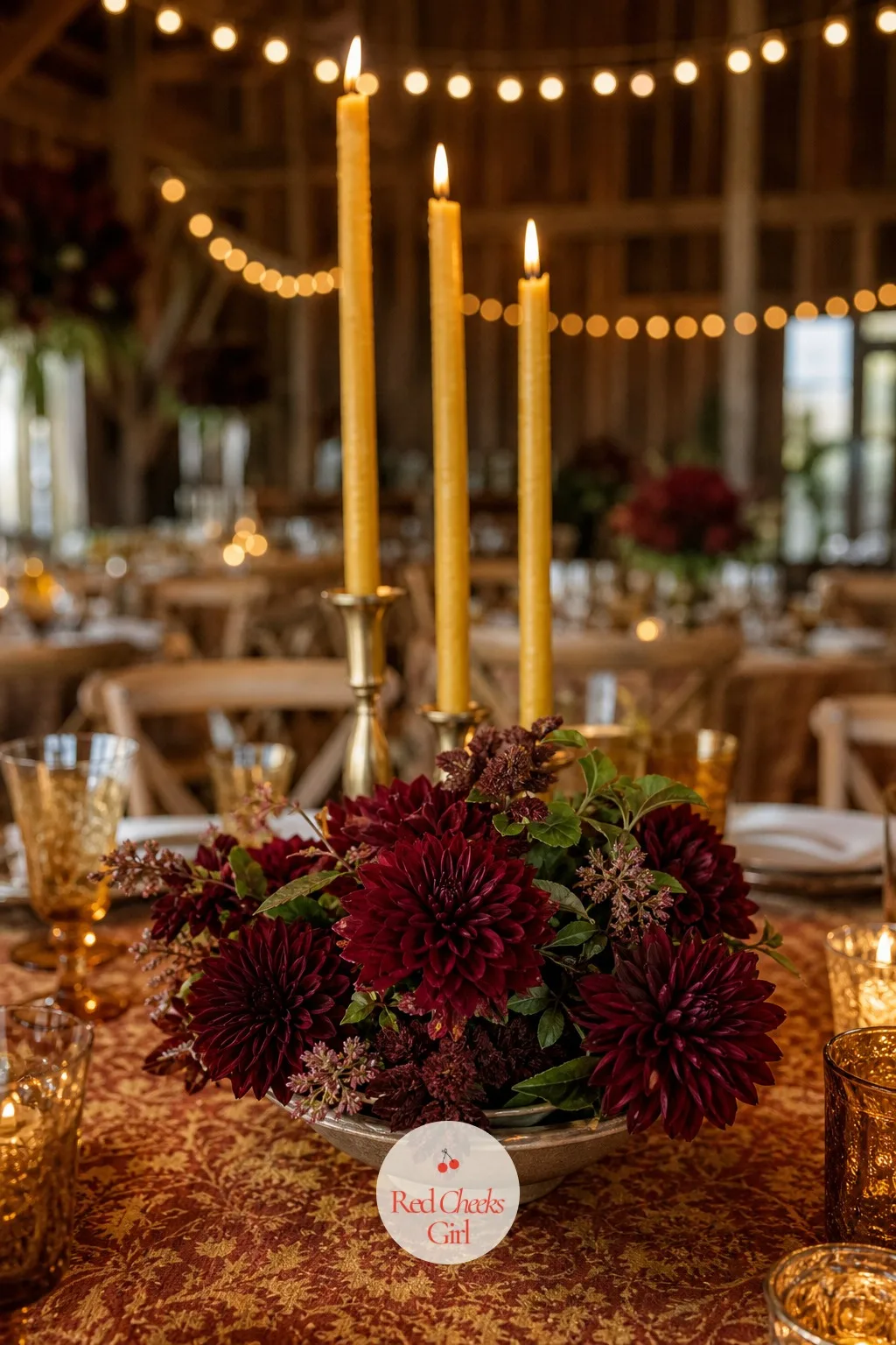 Dahlia and Beeswax Taper Trios — Beeswax tapers burn with a warmer, honeyed light than plain white wax, and set against a dahlia's deep petal count the whole