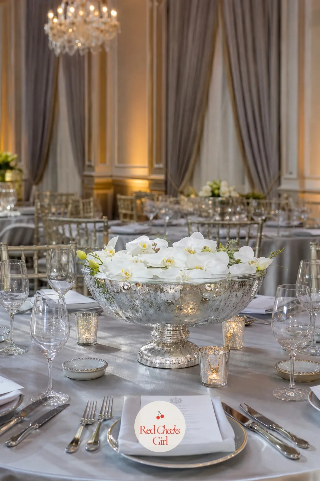 Orchids in Footed Bowls — A footed bowl lifts an arrangement just enough to feel formal without going tall, and orchid heads floating or arranged low inside