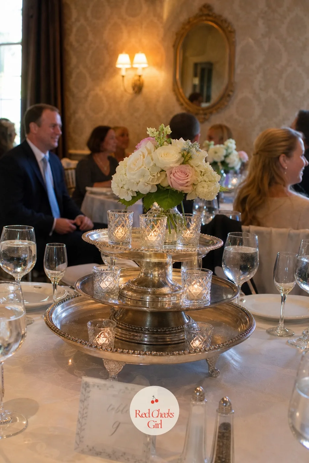 Vintage Silver Trays as Centerpiece Risers — A centerpiece sitting flat on the cloth can get lost next to tall glassware and a stack of plates. Wedding decor