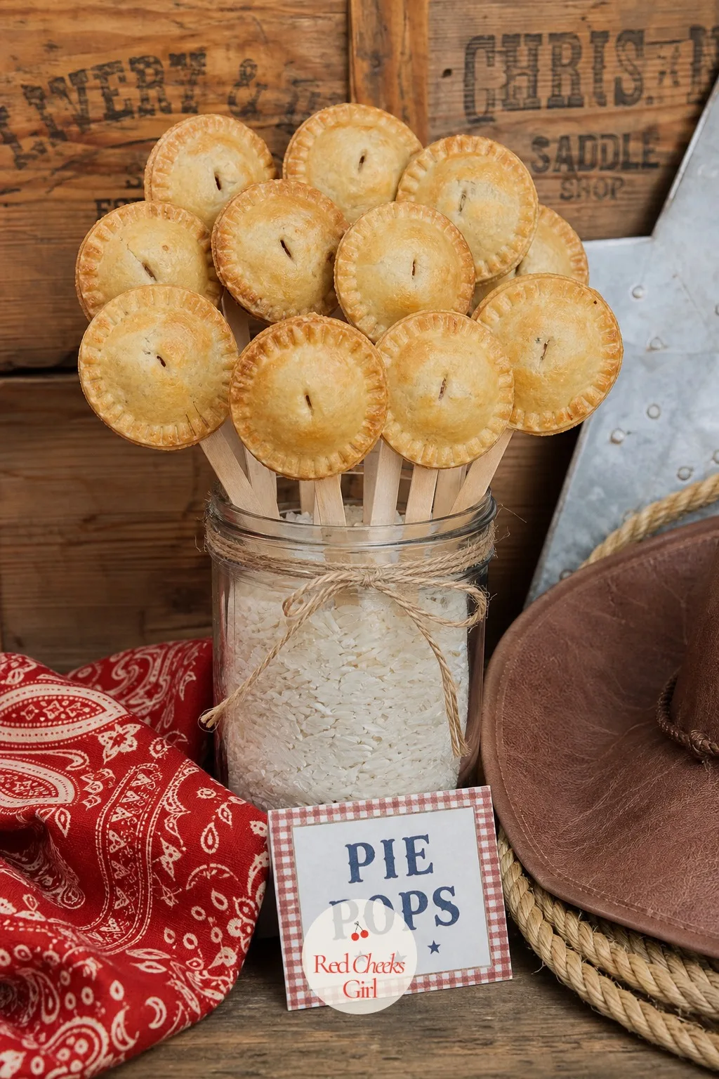 Mason Jar Pie Pops — A whole pie disappears fast on a busy table and is awkward to serve standing up, so small pie pops solve both problems at once. Western