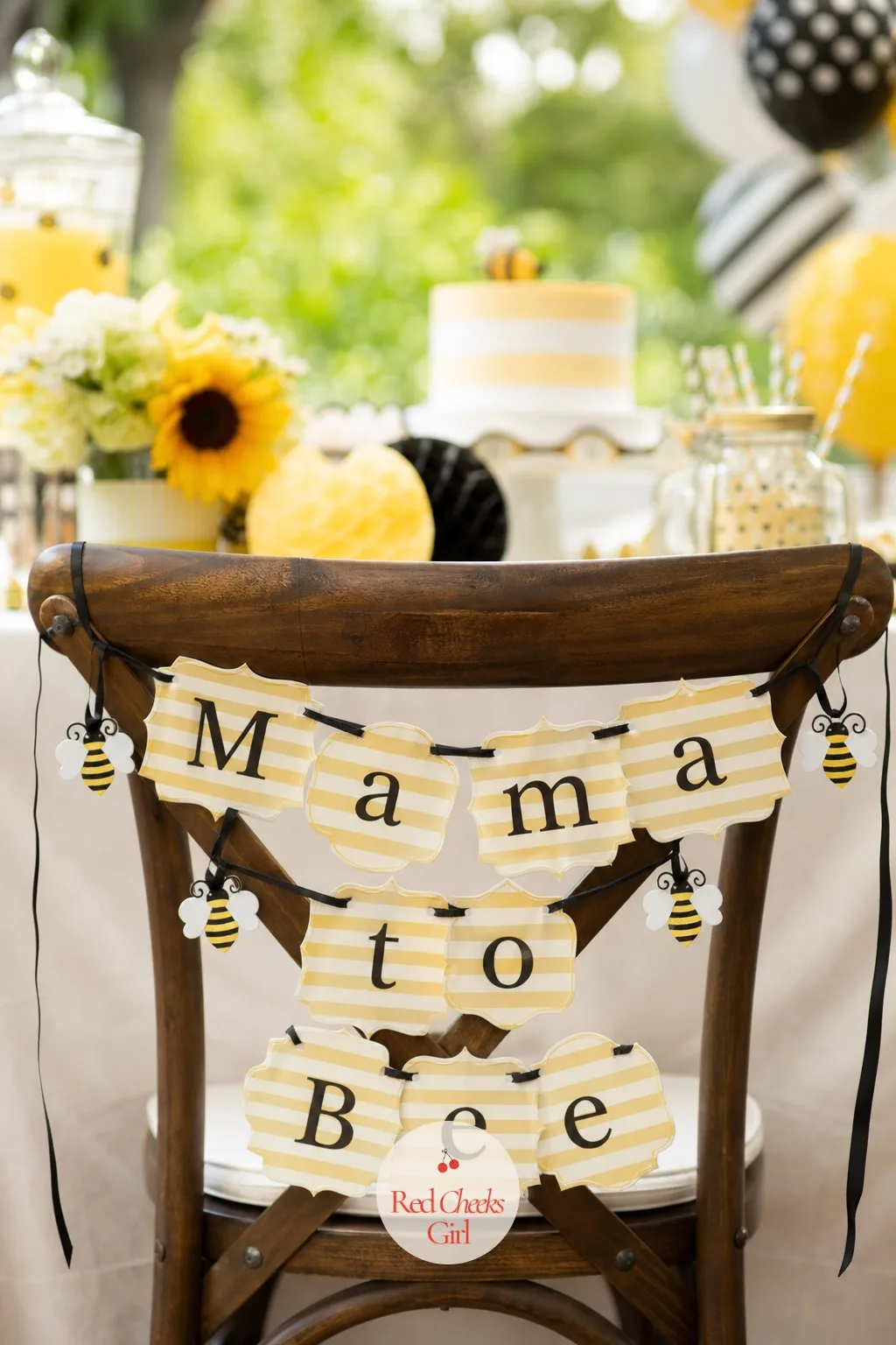 'Mama to Bee' Chair Banner — A standing sign works for the table, but the chair itself often gets overlooked until the photos come back plain. What will it bee