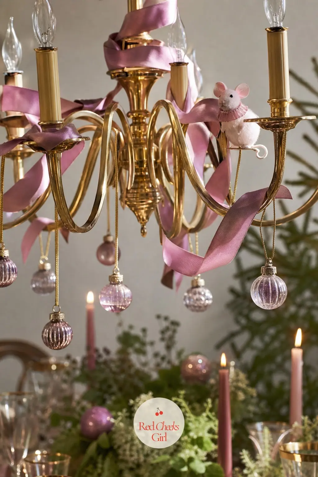 The Chandelier — The dining room light fixture gets wrapped in a spiral of ribbon running pink to lavender, with a handful of small glass baubles in all five