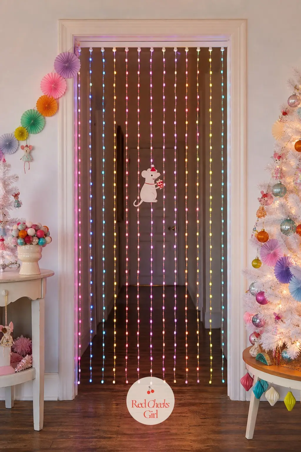 The Doorway Light Curtain — Instead of a garland over the doorway between the hall and the living room, a curtain of rainbow fairy lights hangs straight down