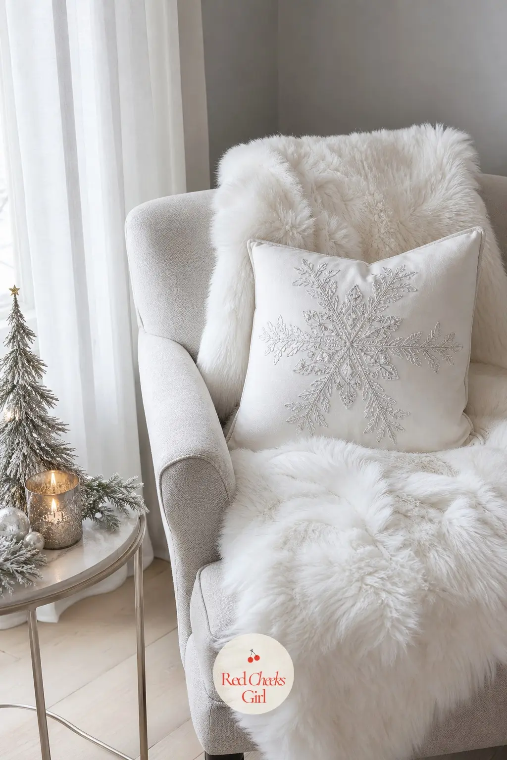 The Armchair Corner, Wrapped in Faux Fur — One deep armchair, angled away from the main seating, holds a stack of throws in ivory and dove grey. White