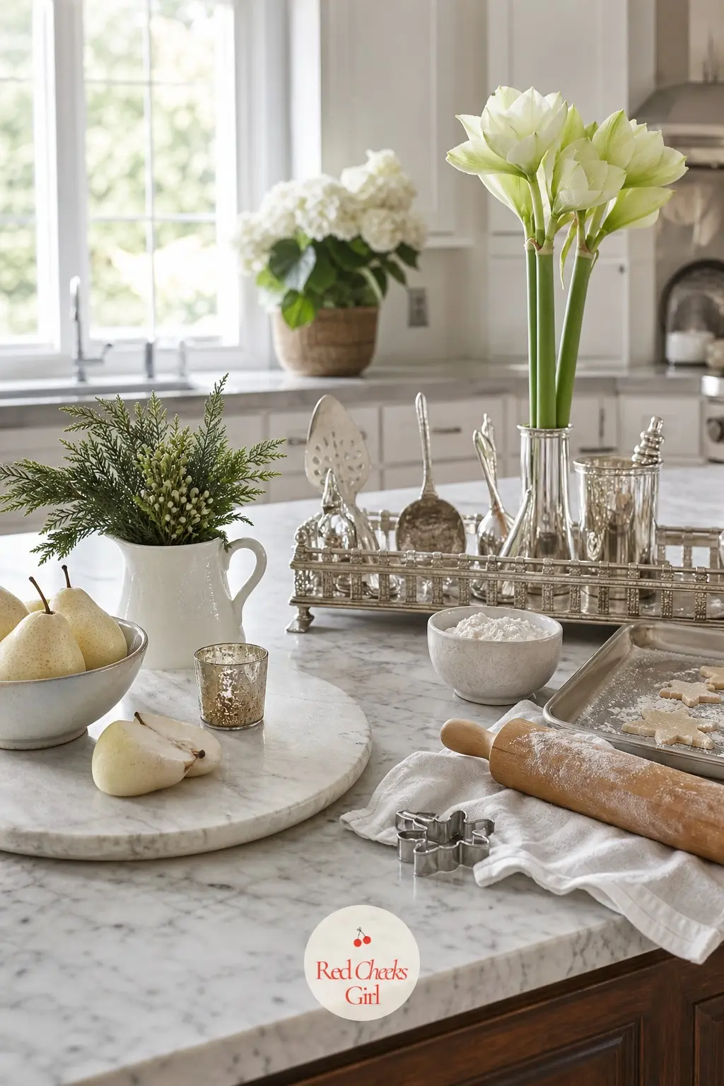 The Kitchen Island, Dressed for Baking Day — The island stays mostly clear, since it has real work to do, but a marble board, a bowl of white pears and a stack