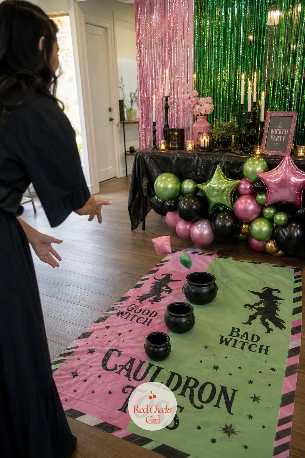 Good Witch Bad Witch Bean Bag Cauldron Toss — A single bucket for bean bag toss gets boring after the third round. Wicked party ideas