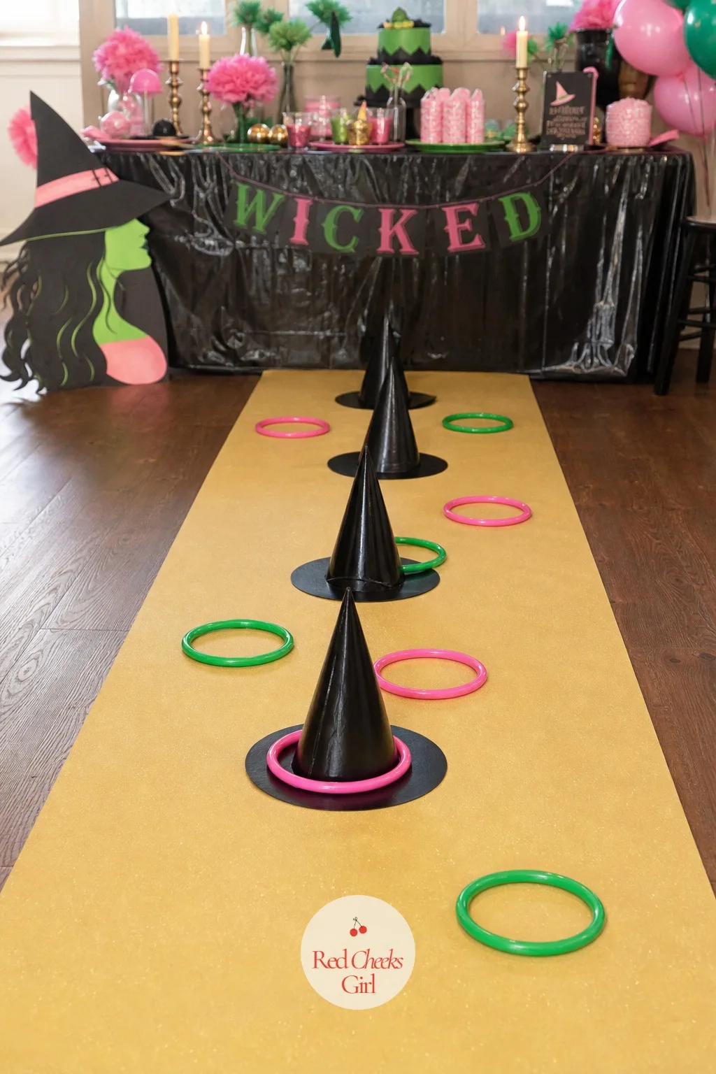 Witch Hat Ring Toss — Ring toss at most parties is a cardboard target propped against a wall, forgettable the moment it ends. Wicked party ideas