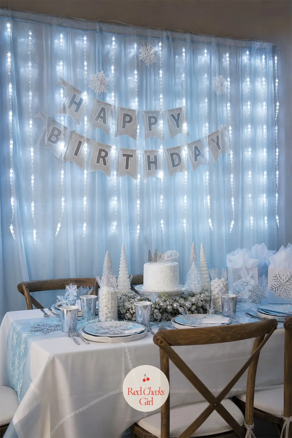 Icicle Twinkle Light Curtain — For the icy palette, this is the backdrop that does the photo work without anyone posing for it. Winter birthday party ideas