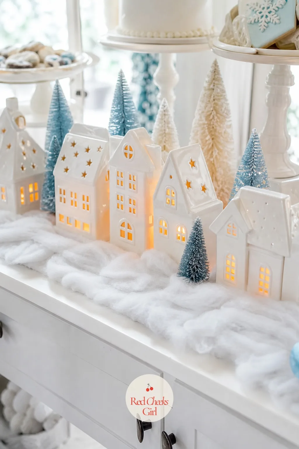 A Miniature Snow Village on the Dessert Table — This one gives children at the party something to look at that is not a cake. Winter gender reveal