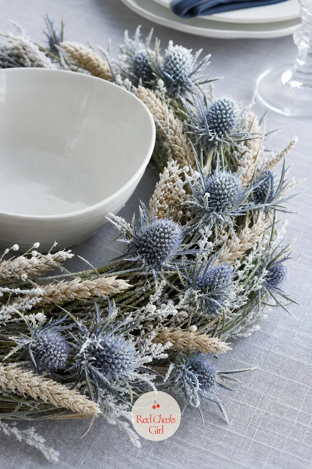 Ice Blue Thistle and Frosted Wheat Table Wreath — Pale ice blue dried thistle heads against frosted wheat stalks make a table wreath that reads as cold and