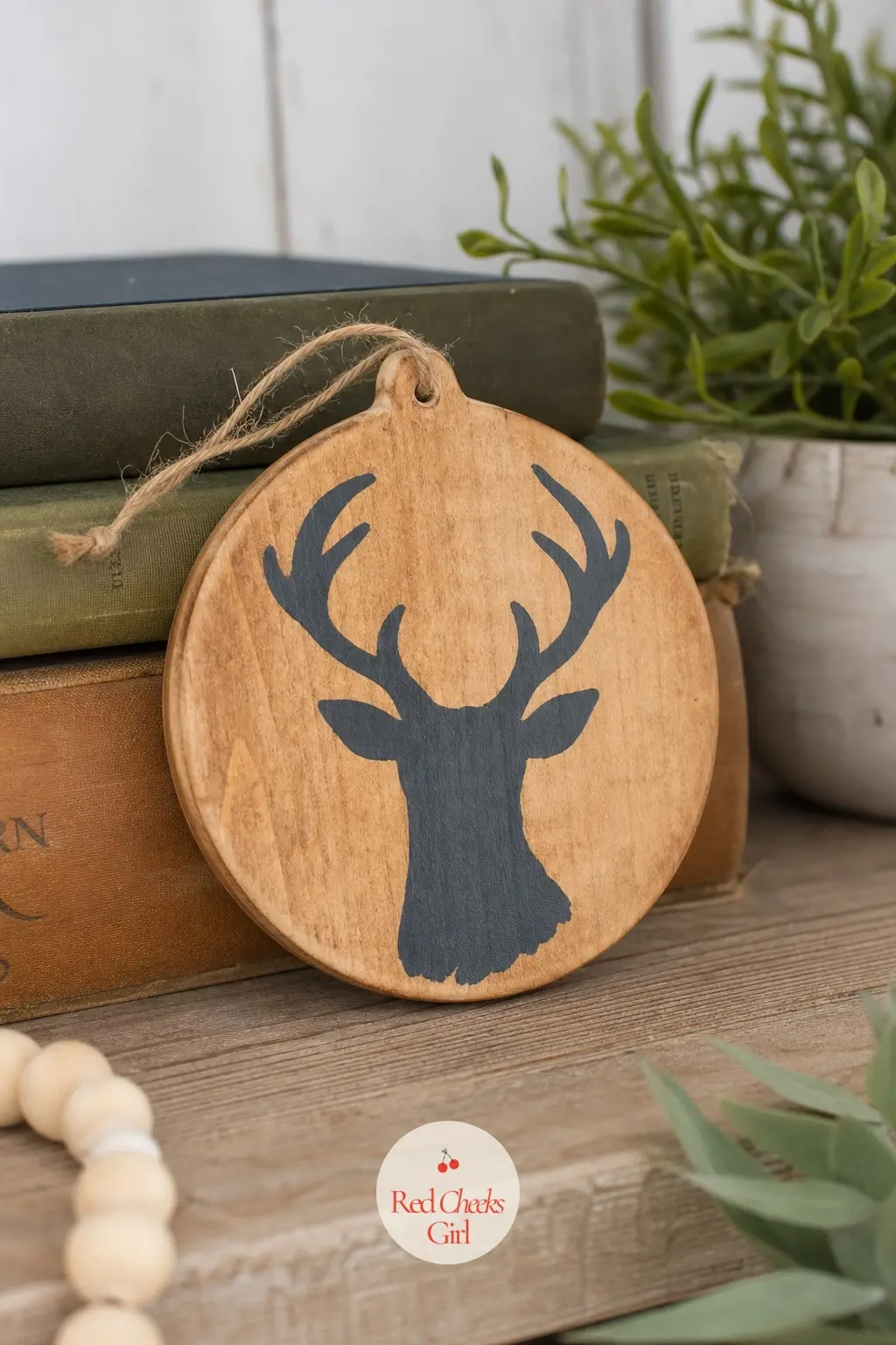 Charcoal Stag Silhouette — Leave the honey-toned wood bare and paint only a stag, solid charcoal grey, standing dead centre. Wood ornament painting ideas