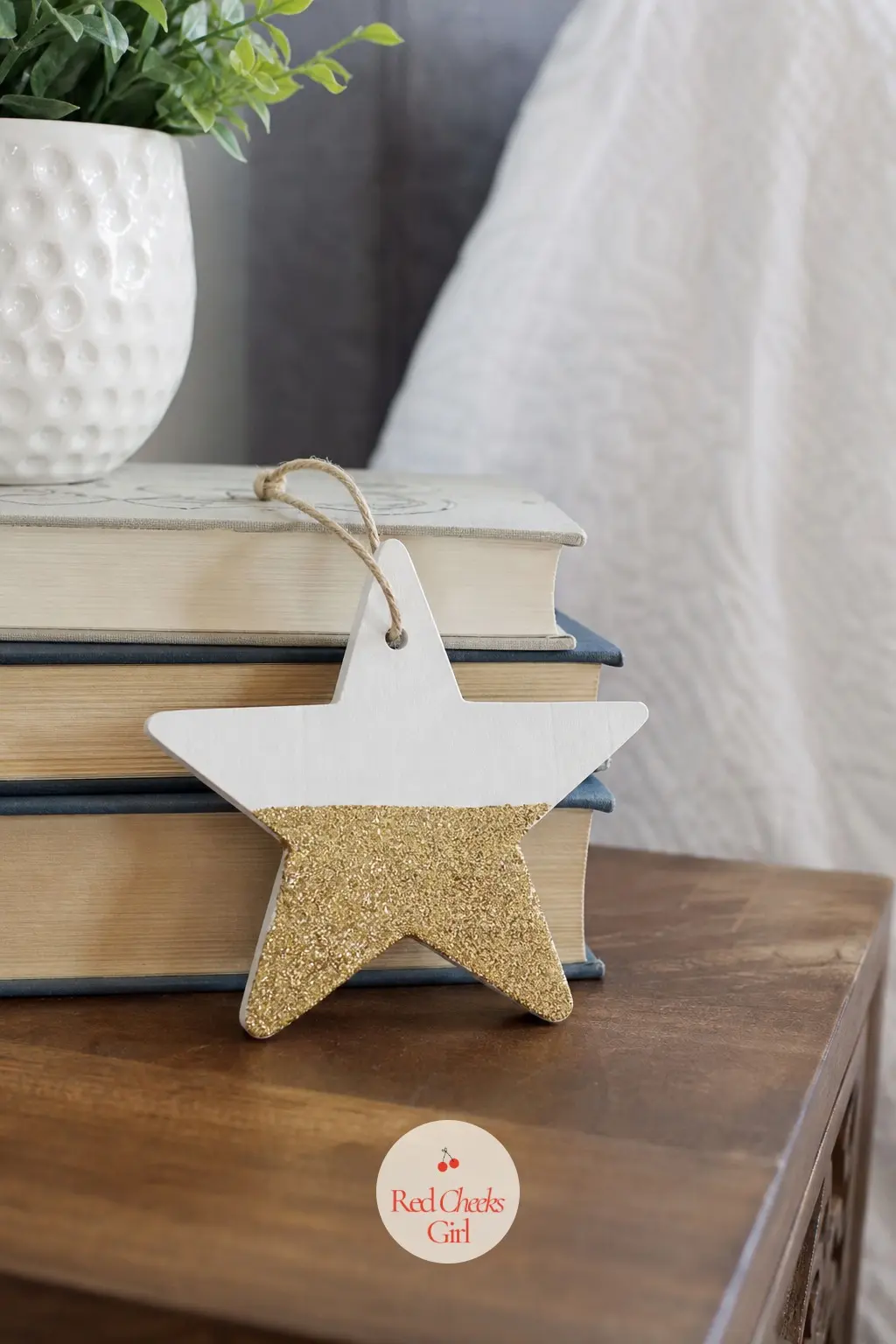 Gold Glitter Star — A white base coat, then the bottom half dipped straight into gold glitter paint for a clean line with none of the loose-glitter mess that