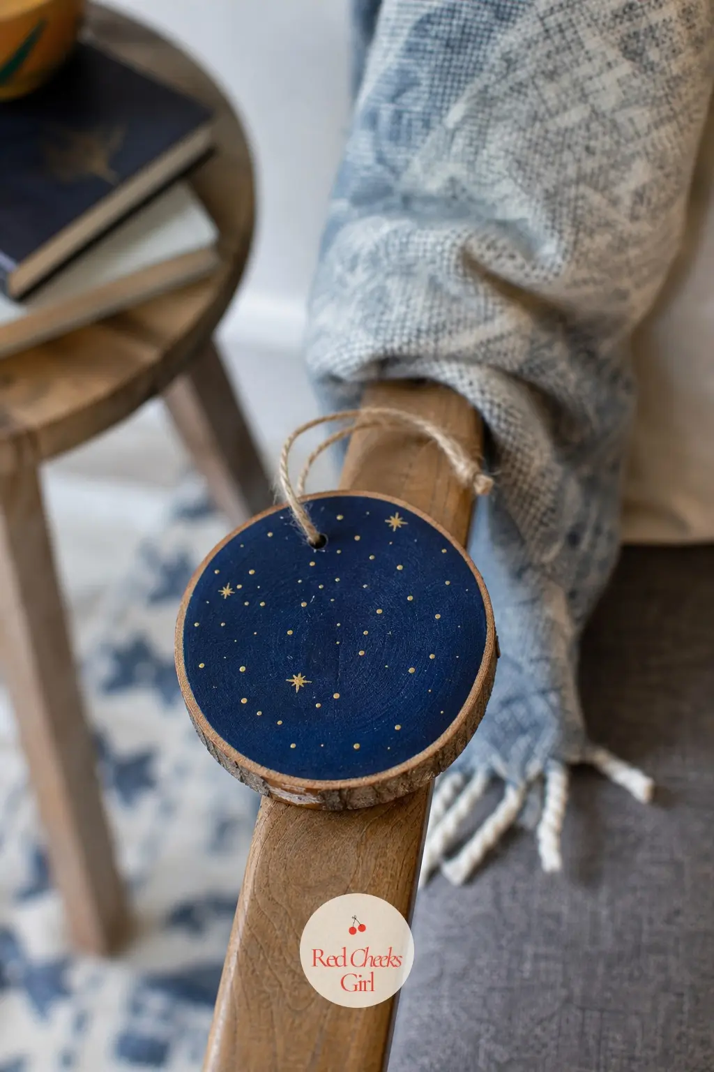 Navy Night-Sky Slice — Deep navy base coat, then a handful of gold paint dots flicked on with the brush tip, no pattern required. Wood ornament painting ideas