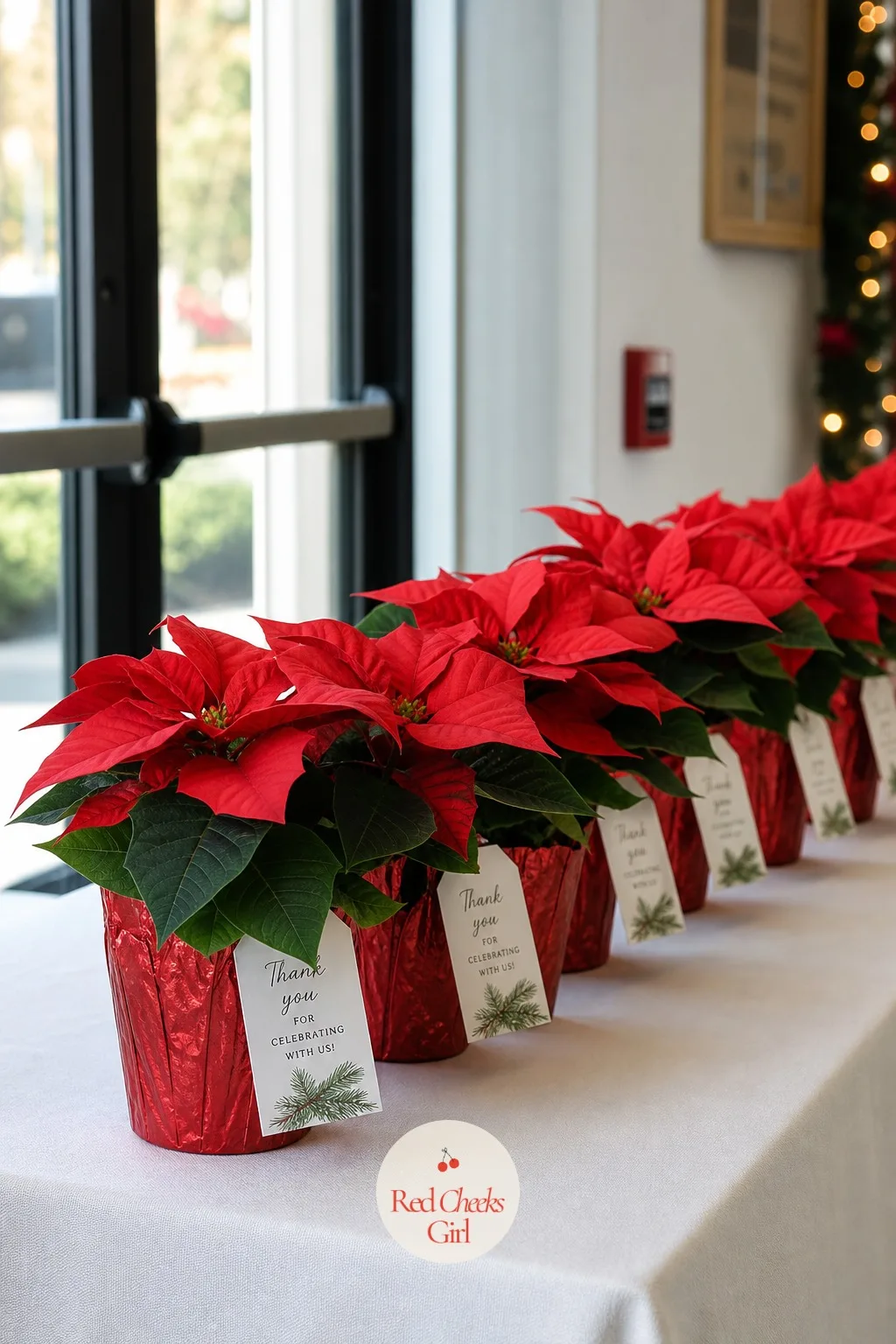 Take-Home Mini Poinsettia Favor — A living plant outlasts almost anything else on a goodie table, including most of the chocolate. Work christmas party ideas